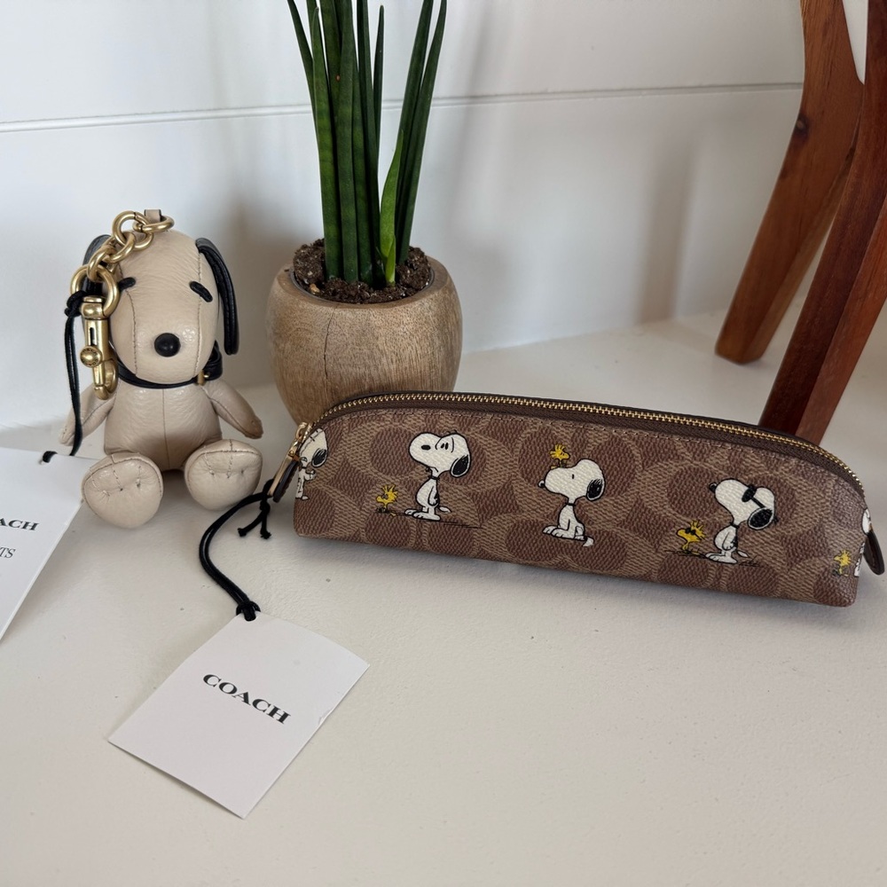 Coach x Snoopy Bundle – Bag Charm & Canvas Pencil Pouch (Brand New) 🖤🤎